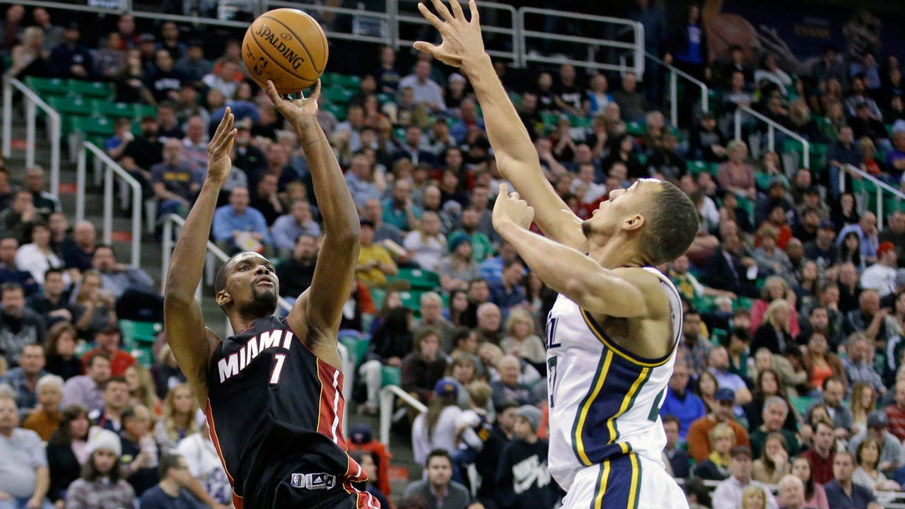 Chris Bosh, Dwyane Wade lead way as Heat hold off Jazz